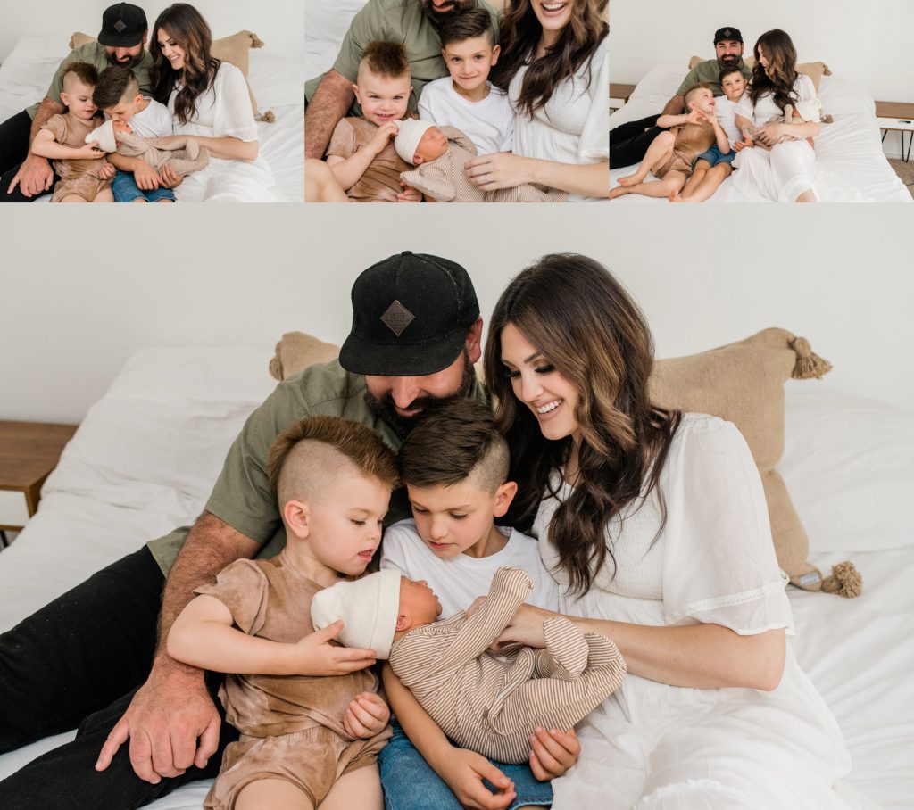 St george lifestyle newborn photographer Tia Stout photo captures a family in their home on the bed with their new baby.
